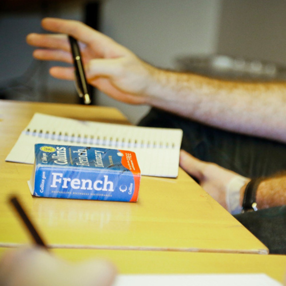 A french dictionary on a desk