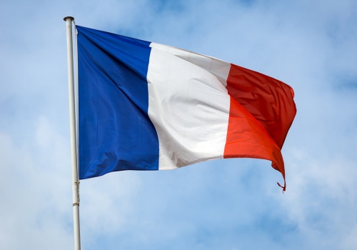 French Flag against a blue sky