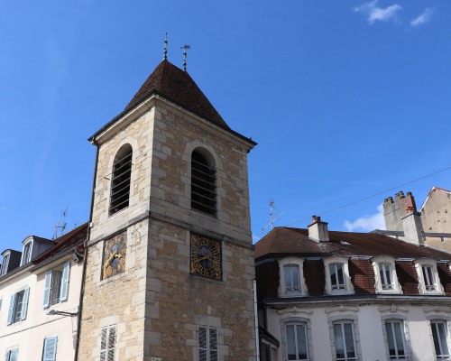 A tower building on a blue day